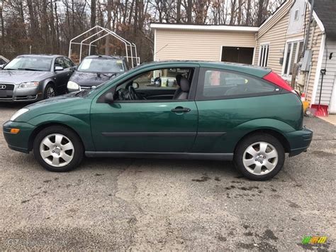 Cloth sport front bucket seats w/manual height adjustments, head restraints. 2001 Rainforest Green Metallic Ford Focus ZX3 Coupe ...