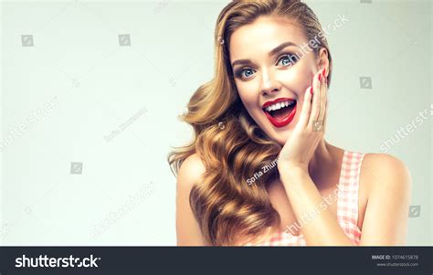 Woman Red Lips Nails Surprise Holds Stockfoto 1074615878 Shutterstock