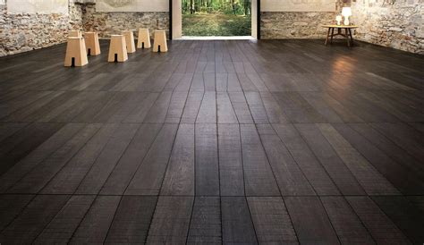 This will help avoid the space from appearing too dark. gray wood floor stain grey laminate flooring lowes | Grey laminate flooring, Grey wood floors ...