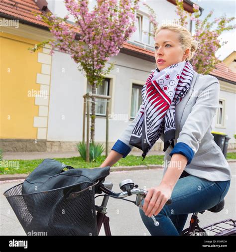 Woman Riding Bicycle Stock Photo Alamy