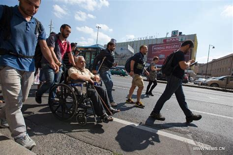 Refugees From Hungary Walk To Vienna Cn