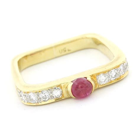 18 kt yellow gold 0 33ct genuine diamond and ruby ring size 4 5 property room