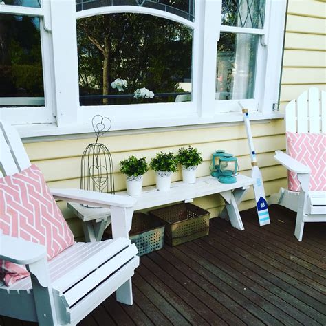 Having an outdoor chair to lounge by the patio and the front porch is all possible with adirondack chairs. Front porch, white adirondack chairs with white benchseat ...