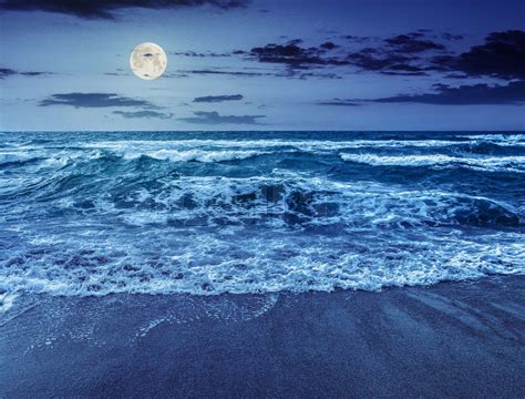 Sea Waves Running On Sandy Beach At Night Stock Image Colourbox