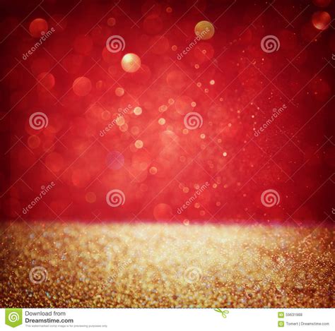 Abstract Background Of Red And Gold Glitter Bokeh Lights