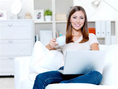 Emma watson has offered an update on guillermo del toro's beauty and the beast. Woman with laptop and cup of coffee — Stock Photo ...