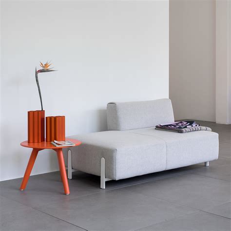 Oval oak brown top, with a sheet metal base. Objekte unserer tage - Meyer coffee table | Connox