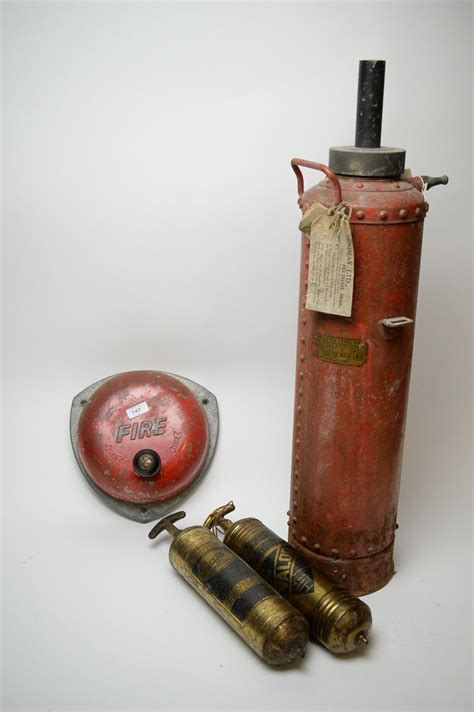 Lot 747 Three Vintage Fire Extinguishers And A Wall