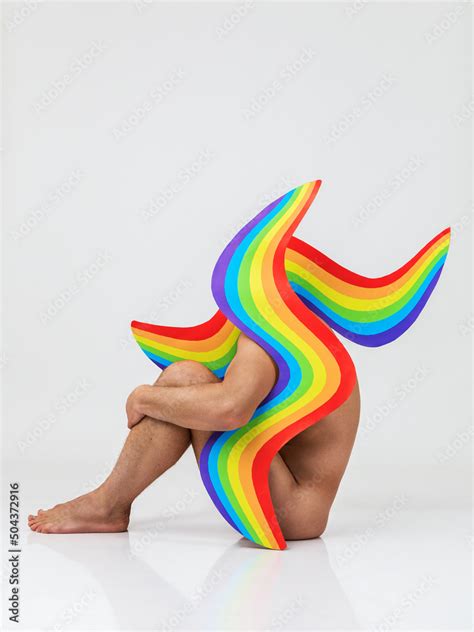 Naked Man Sitting Behind Waveforms With Rainbow Pattern Concept Of Lgbtq Pride Lgbtq People