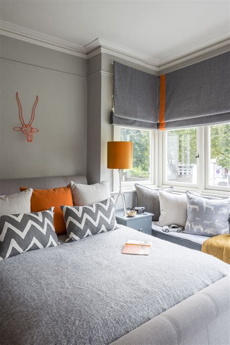 Make any room in your abode instantly more inviting with a window seat. Boy's bedroom with bespoke joinery providing a window seat ...