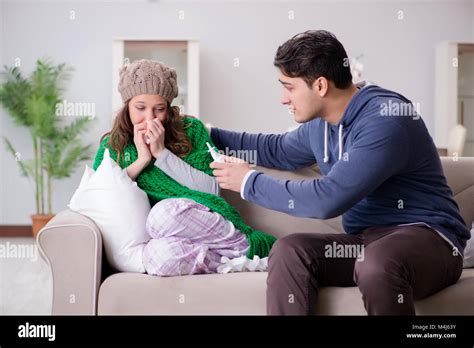 Husband Caring For Sick Wife Stock Photo Alamy