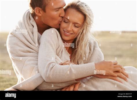 Two Seated Embracing Couples Hi Res Stock Photography And Images Alamy