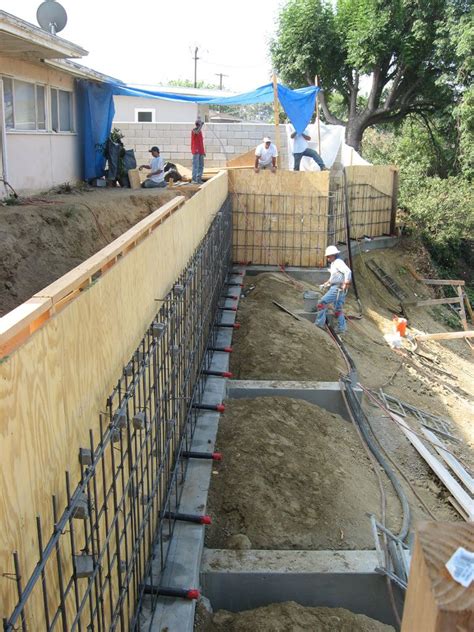Only two block forms are required for any size. Concrete Retaining Wall- Rebar Install | garden | Pinterest
