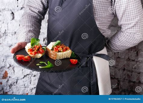 Waiter Offering Delicious Restaurant Dish Stock Image Image Of Hand