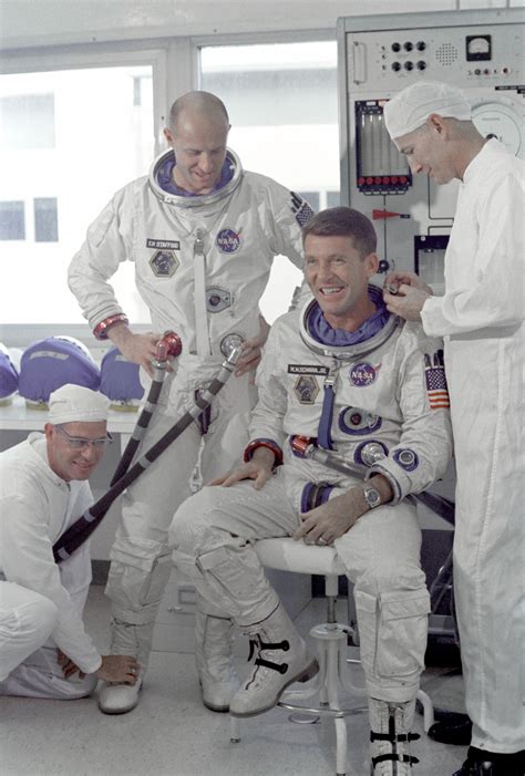Astronauts Walter M Schirra Jr Seated Command Pilot And Thomas P