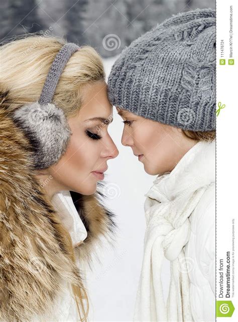 Beautiful Blonde Woman With Baby Mom And Daughter On Snow In Winter