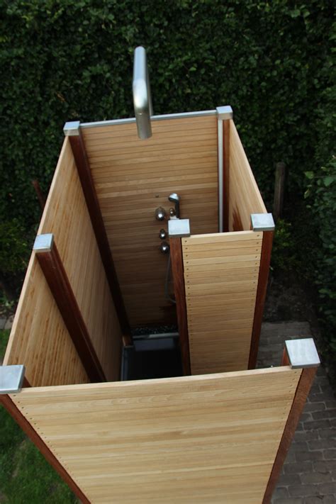 Get the connections right and you can install a shower pretty much anywhere in your bathroom. Outside shower buitendouche diy | Outdoor shower enclosure ...