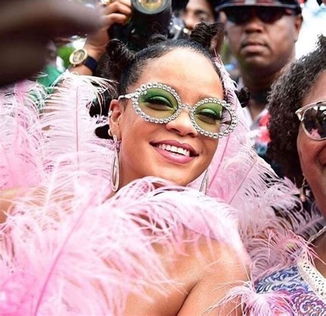 Rihanna Shines With Feathered Carnival Look At Crop Over Festival