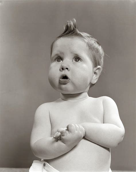1950s Worried Baby Looking Up Uncertain Photograph By Vintage Images