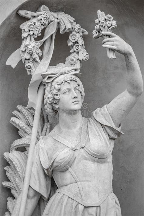 Statue Of Sensual Busty And Puffy Renaissance Era Woman In Circlet Of Flowers Potsdam Germany