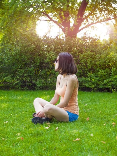 Young Girl Sitting On The Grass Stock Image Image Of Sitting Girl