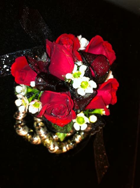 Wrist Corsage Of Red Spray Roses And White Waxflowers Hawleys Florist