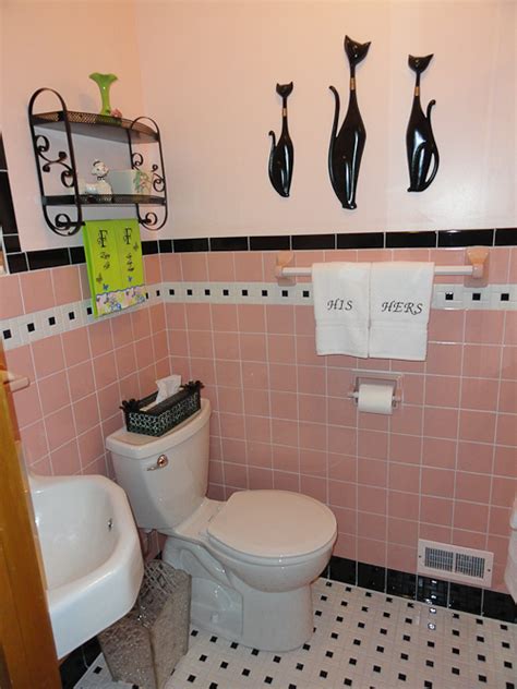 This bathroom's pink tiles surround the pink sink, ceramic soap holders, and floral accent tiles. Janice adds a 1950s pink bathroom to her mid century house ...