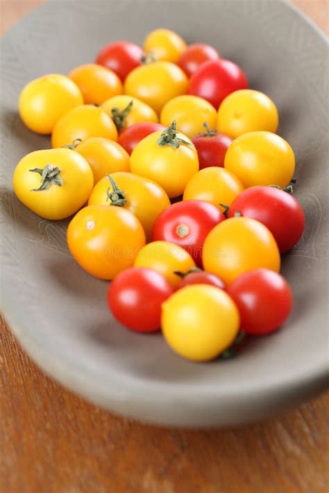 Yellow And Red Cherry Tomatoes Stock Photo Image Of Food Yellow