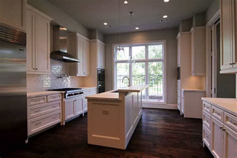 Kitchen cabinets and bathroom vanities can be painted, revitalizing an old kitchen or bathroom. Kitchen Remodeling - Skills Construction