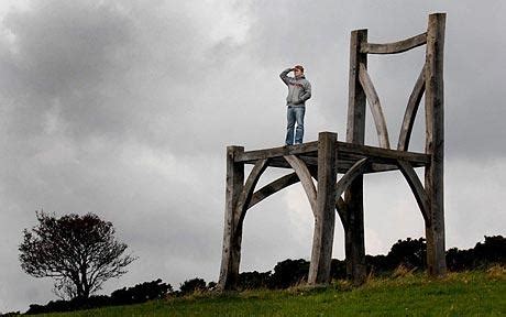 The chair measures in at six and a half feet and is available with leather upholstery and a variety of wood finishes. Giant chair on Dartmoor to be pulled down - Telegraph