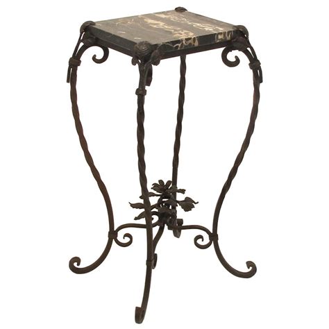 Plenty of small iron side table to choose from. XXX_8128_1334691941_1.jpg