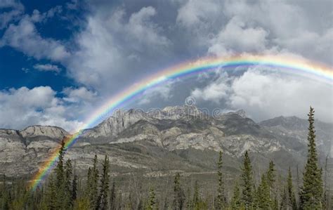 Rainbow With Clouds In The Mountains Of Canada Stock Photo Image Of