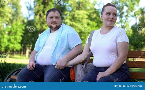 Obese Couple On First Date Man Tenderly Holding Girlfriend Hand Love