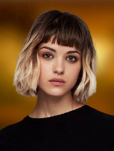 This super chic haircut plays with angles by flaunting strands that are longer on one side. Wavy-Bob-with-Bangs - Hair Colors