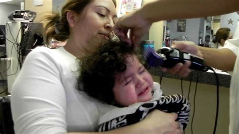 His hair is thin, but is down to his eyebrows. Baby's first haircut - YouTube