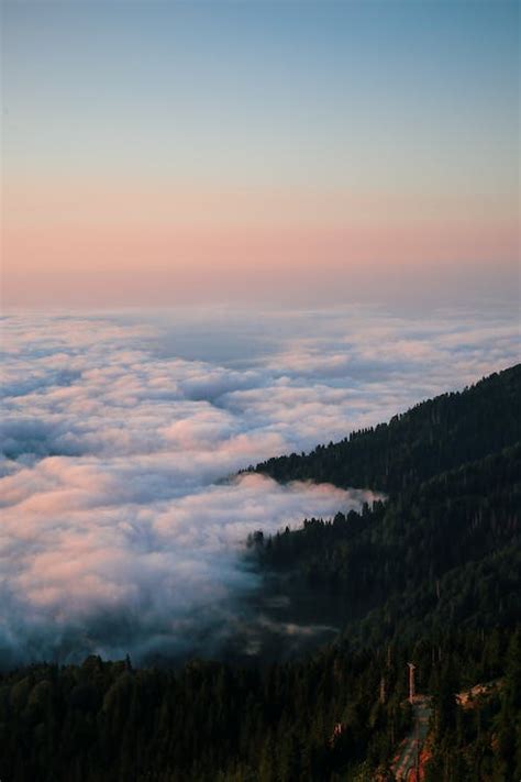 Clouds And Mountainside · Free Stock Photo
