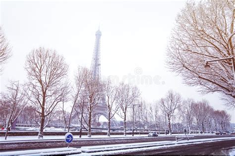 Snow Covered Streets Of Paris And The Eiffel Tower Stock Image Image