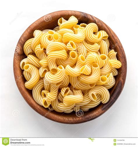 Lumaconi Macaroni In A Wooden Bowl On A White Background Stock Image