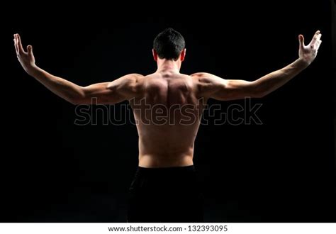 Back Of A Muscular Man Naked Studio Shot
