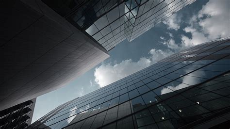 Low Angle Photography Of Curtain Wall Building Building Reflection Clouds Worm S Eye View Hd