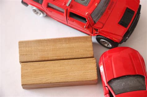 Premium Photo Close Up Of Two Red Toy Cars Accident Car Insurance