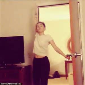 Miley Cyrus Shows Off Some Her Best Moves As She Gyrates Around Door Daily Mail Online