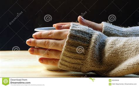 Woman Holding Cup Of Coffee Warming Her Hands Stock Photo Image Of