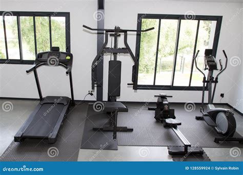 Fitness Club With Different Machines In The Gym Equipment For Training