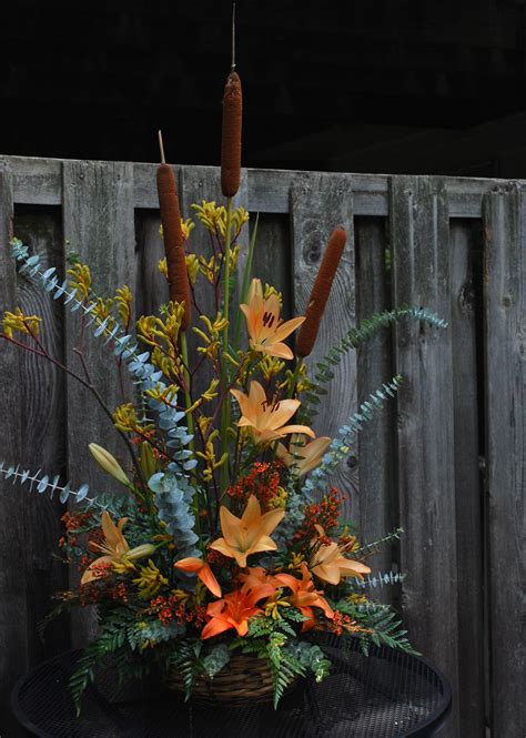 Dramatic Centerpiece Arrangement With An Elegant Rustic Look Fall