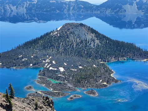 Here Is A Picture Of Wizard Island In Crater Lake National Park That I