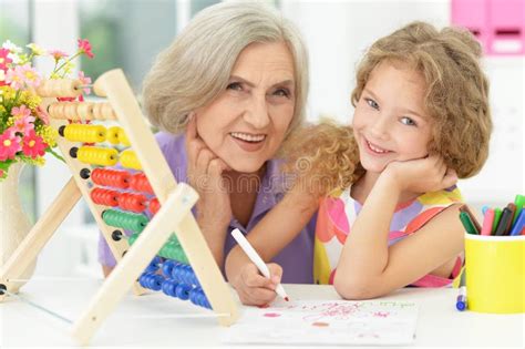 Girl Making Homework With Granny Stock Image Image Of Happy