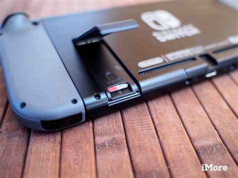 The microsd card slot is hidden behind the switch's stand. Best microSD cards for your Nintendo Switch | iMore