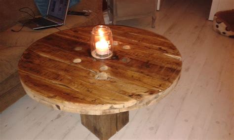 Rustic coffee table with hollow log base. made a rustic coffee table from cable drum and a block of ...