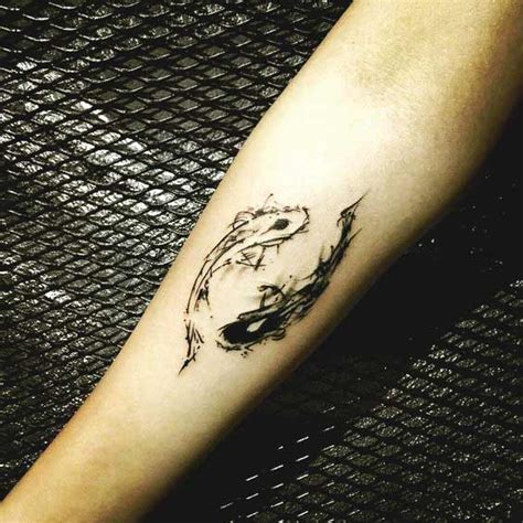 Rihanna pisces tattoo behind ear. 40 Best Pisces Tattoos Designs And Ideas With Meanings